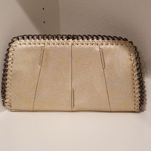 Big Buddha Kiss Lock Gold Clutch